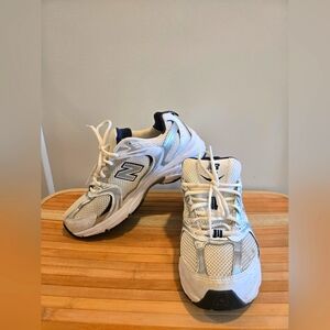 New Balance White and Blue Sneakers